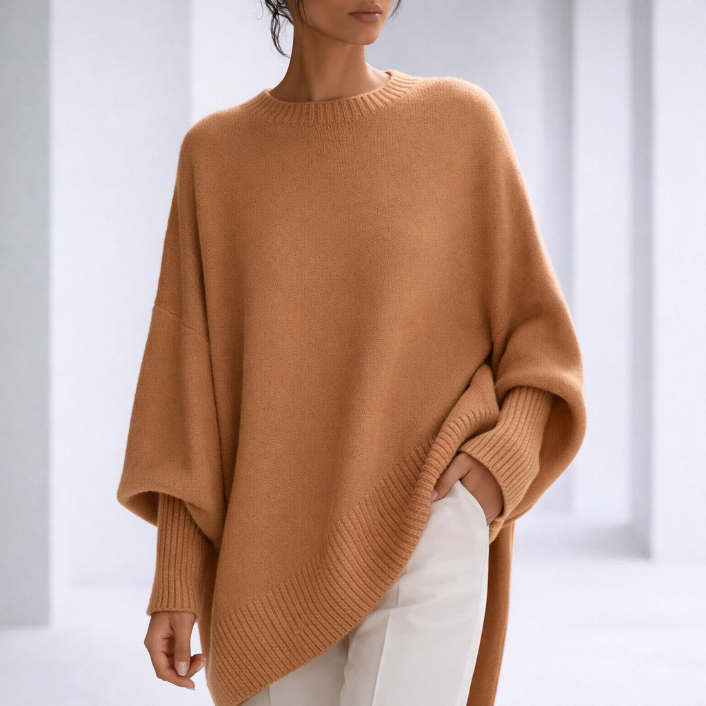 Women's Oversized Crewneck Sweater with Ribbed Cuffs and Hem in Camel, worn in a bright studio
