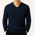Men's Cable Knit V-Neck Sweater with Diamond Pattern in Blue, front view on a model