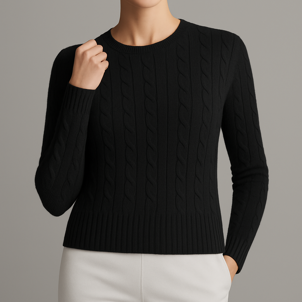 Women's Classic Cable Knit Crewneck Sweater with Ribbed Trim in Black, worn with white pants