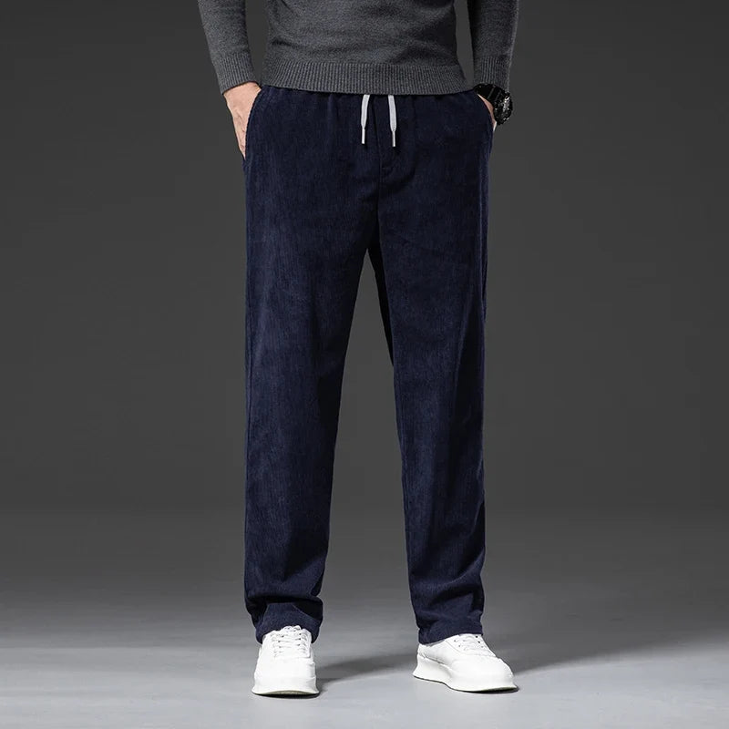 Men's blue corduroy pants with elastic drawstring waist and straight leg