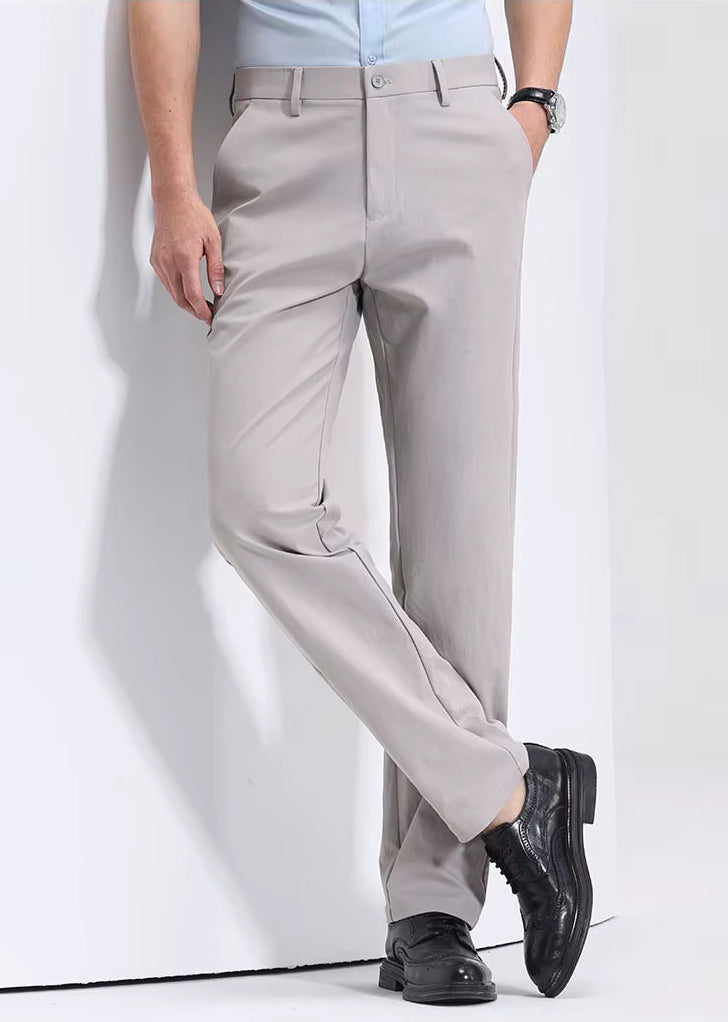 Khaki straight-leg dress pants styled with a light blue shirt