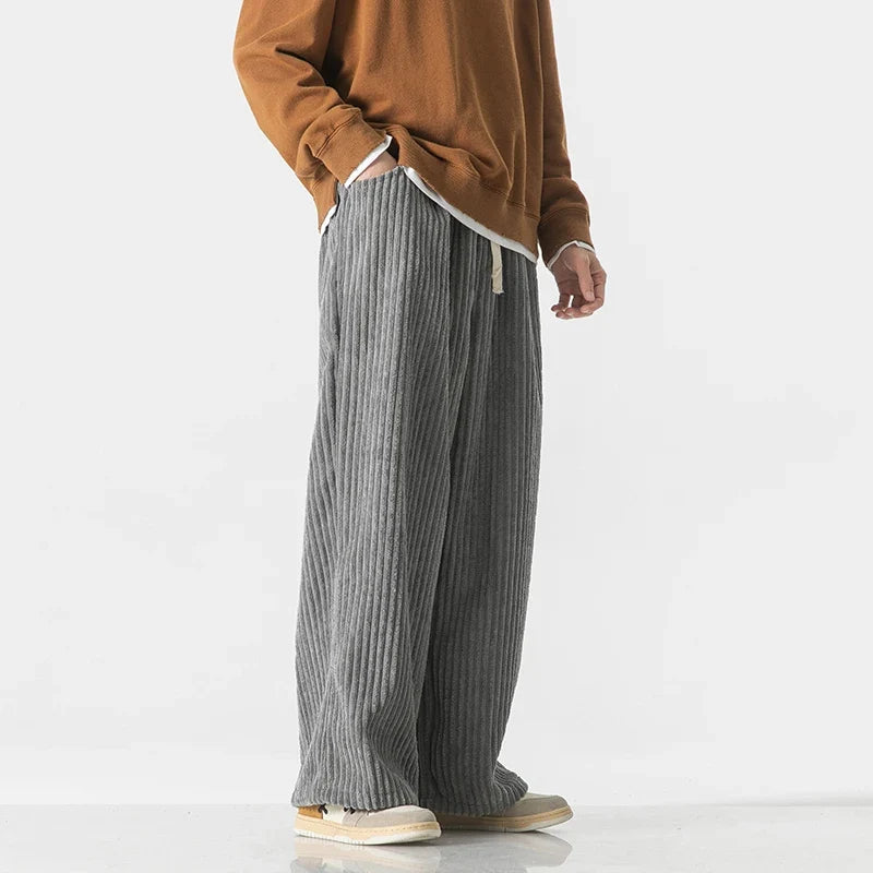 Side view of dark gray wide-leg corduroy pants