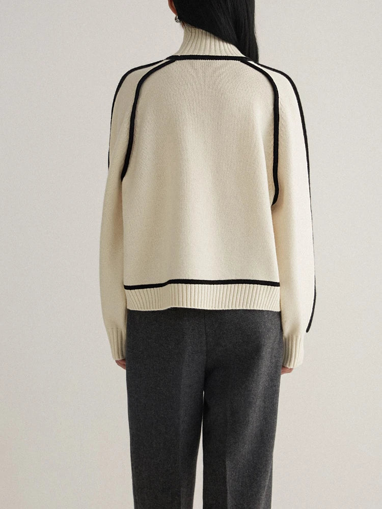 Women's Ribbed Turtleneck Sweater with Contrast Piping in Cream, back view on a model