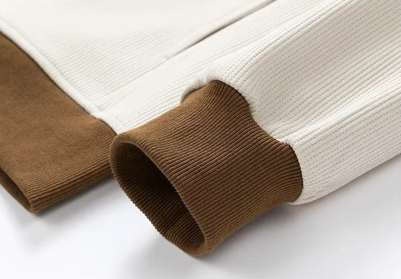 Men's Button-Up V-Neck Cardigan with Striped Sleeve in White, close-up of the cuff