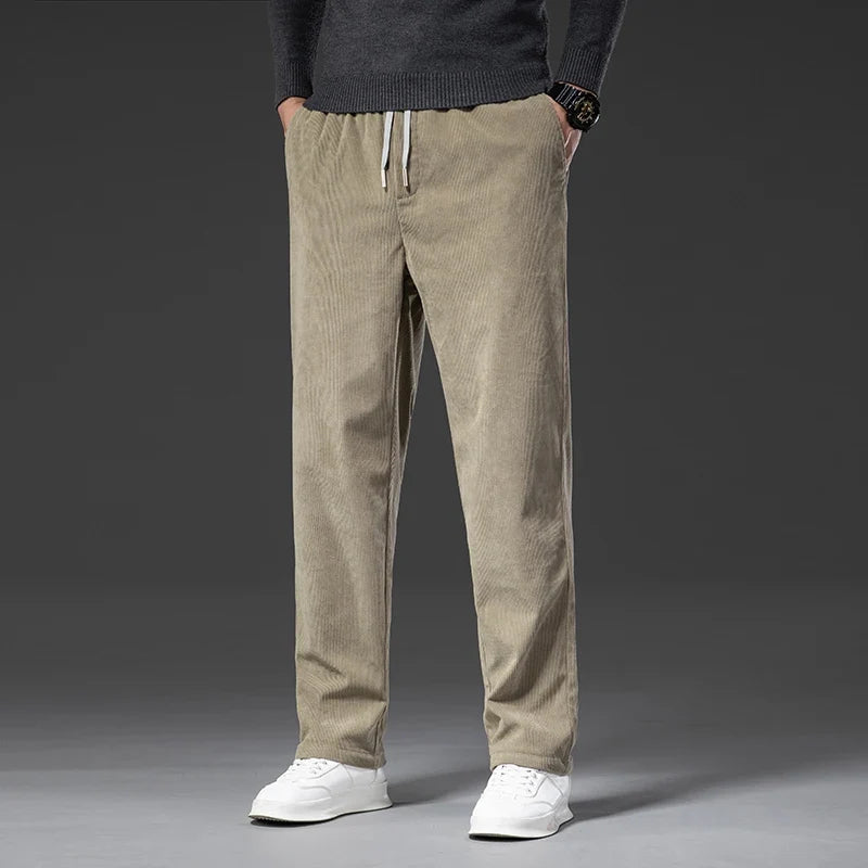 Men's khaki corduroy pants with elastic drawstring waist and straight leg