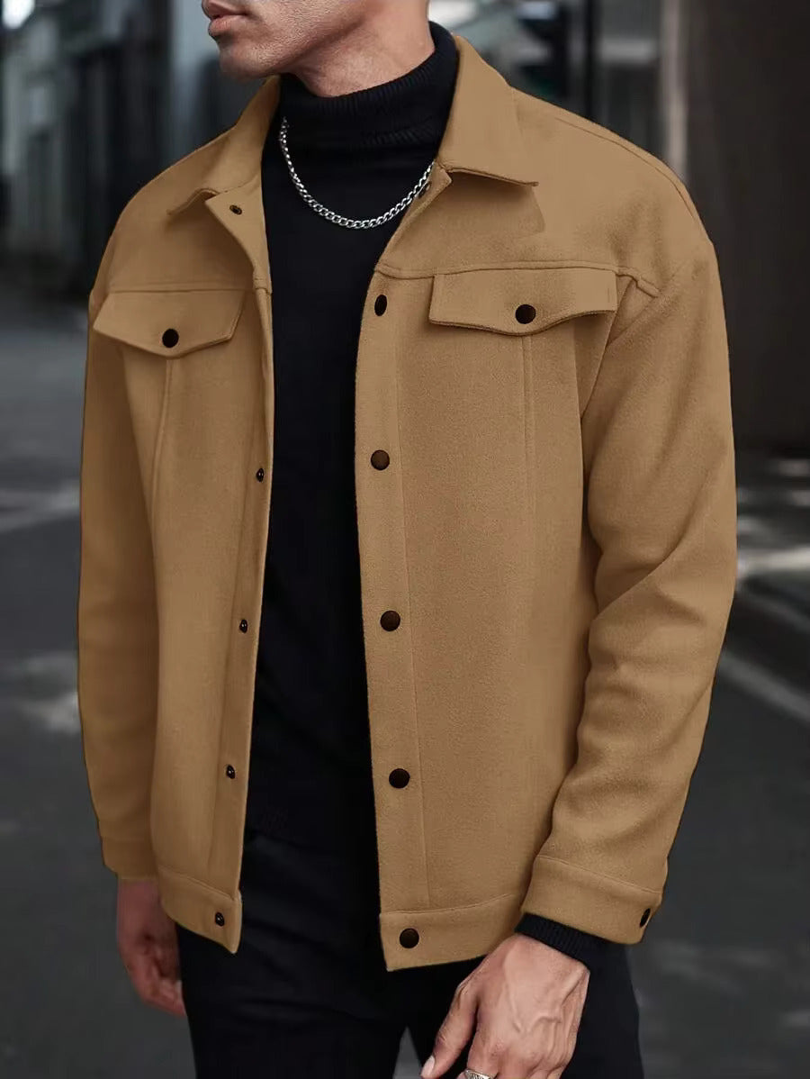 Brown trucker jacket layered over a black turtleneck