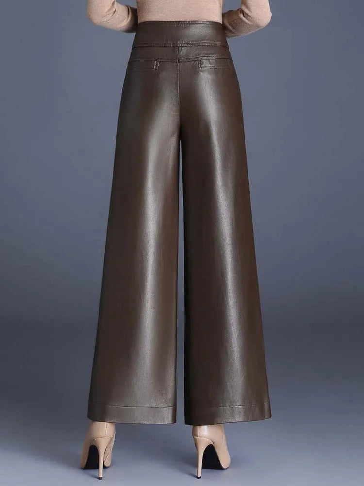 Back view of coffee brown cropped wide-leg leather-look pants