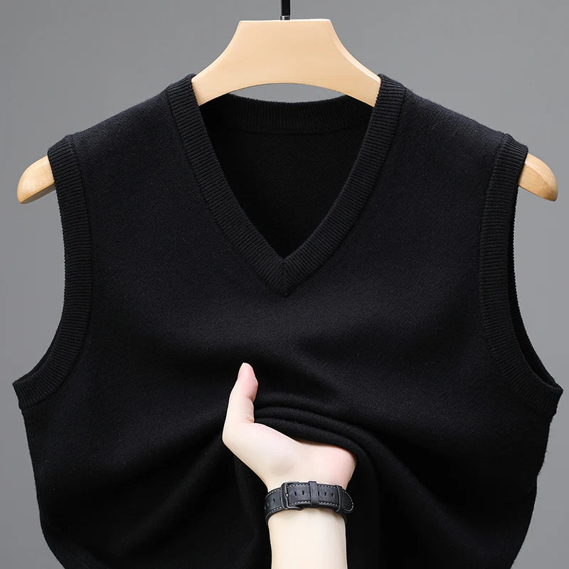 Men's Sleeveless V-Neck Sweater Vest with Ribbed Knit Trim in Black, front view on a hanger