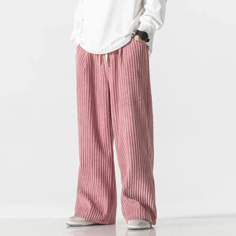 Side view of pink wide-leg corduroy drawstring pants