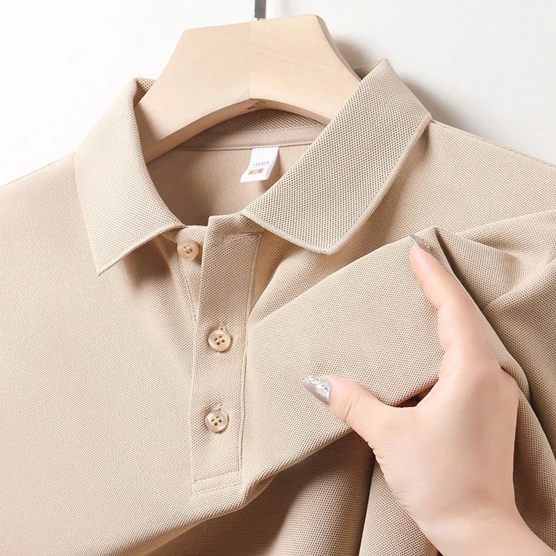 Close-up of the collar and three-button placket on a men's almond polo shirt