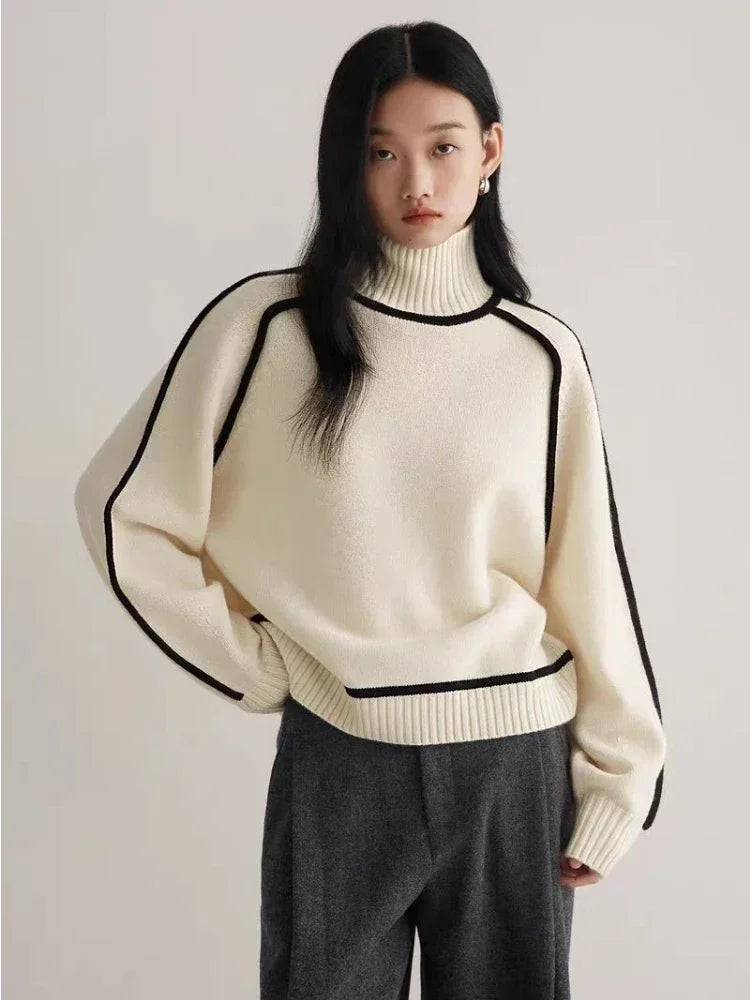 Women's Ribbed Turtleneck Sweater with Contrast Piping in Cream, front view on a model
