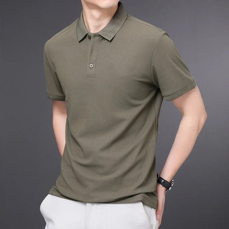 Man wearing a dark green textured knit polo shirt with short sleeves