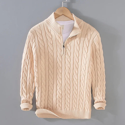 Men's cable knit half-zip sweater in beige with ribbed stand collar on a hanger