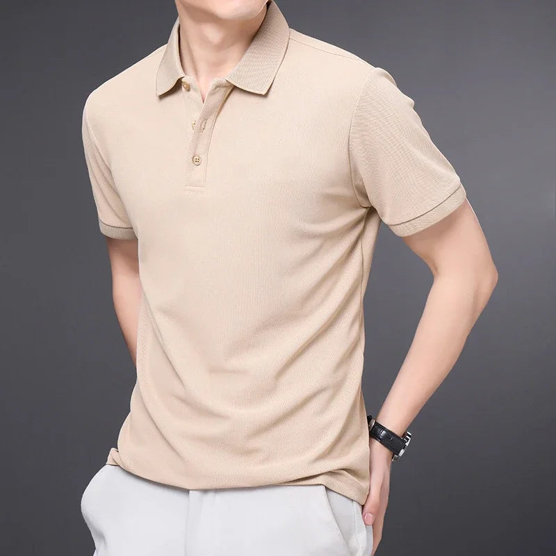 Man wearing an almond textured knit polo shirt with short sleeves