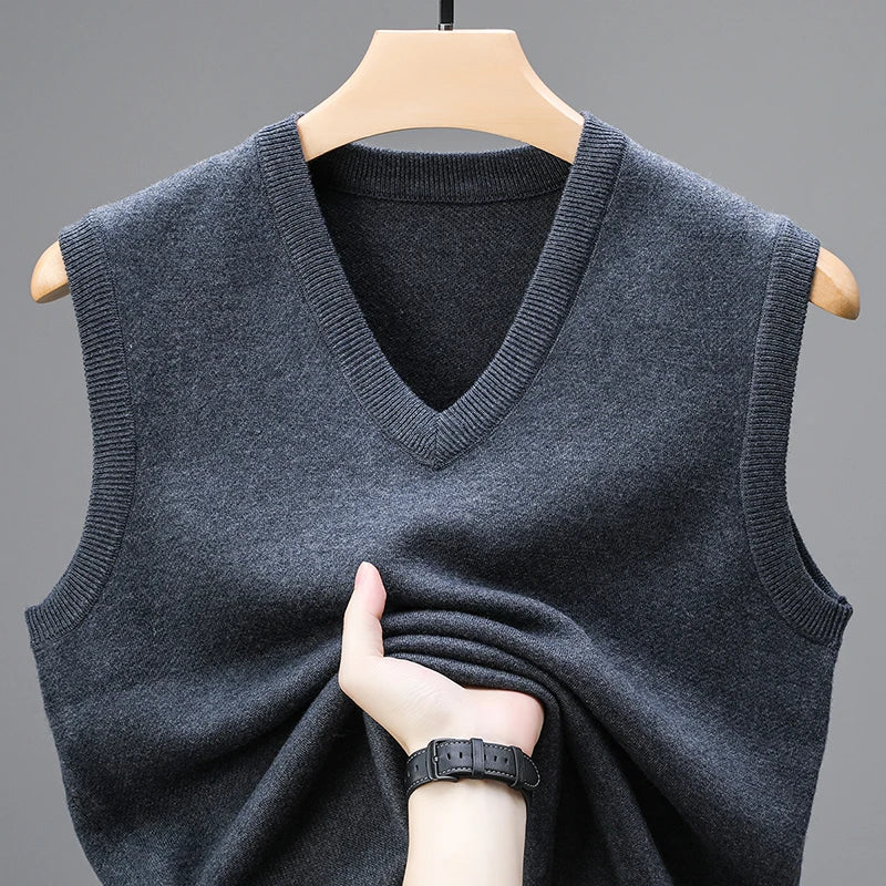 Men's Sleeveless V-Neck Sweater Vest with Ribbed Knit Trim in Dark Gray, front view on a hanger
