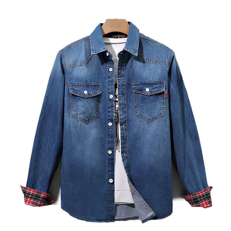 Men's light blue denim shirt with buttoned chest pockets, studio view