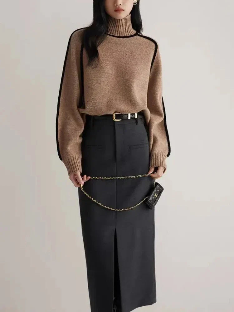 Women's Ribbed Turtleneck Sweater with Contrast Piping in Coffee, worn with a long skirt