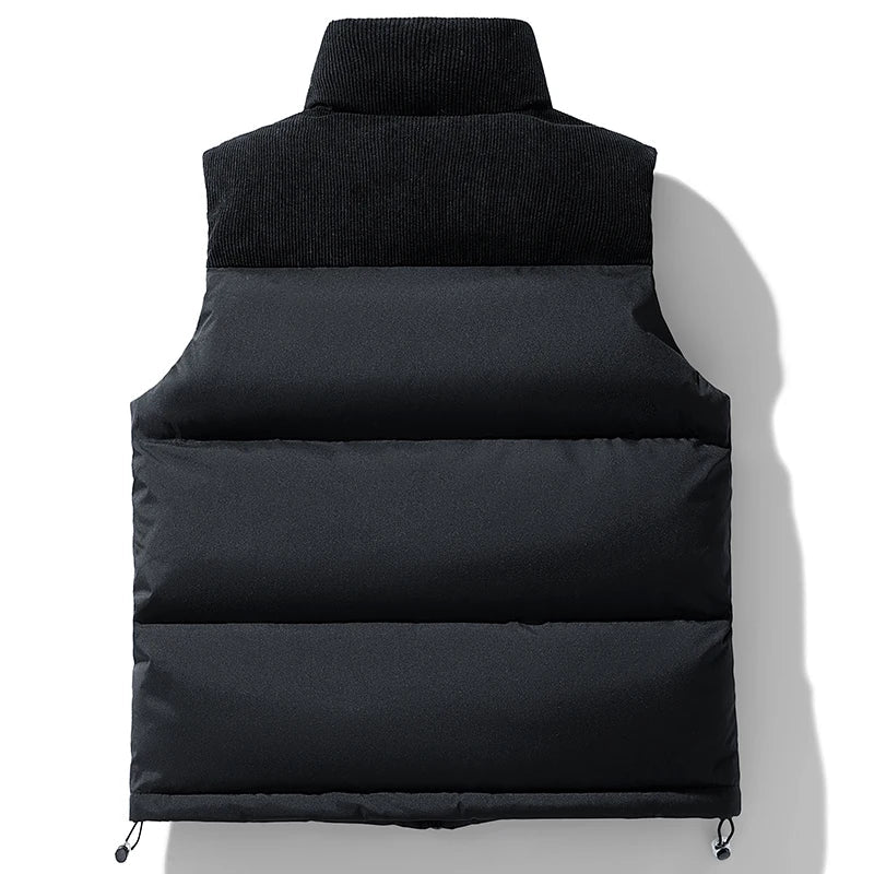 Back view of a men's black quilted puffer vest with corduroy yoke and hem toggles