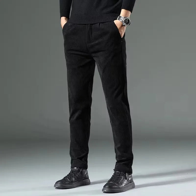 Side view of men's black corduroy dress pants