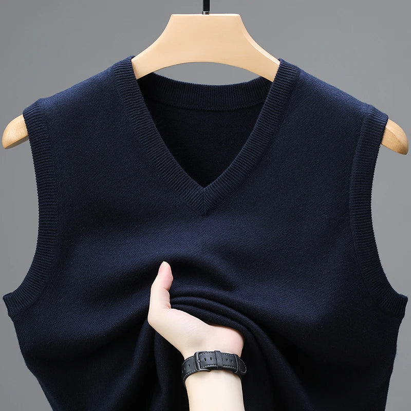 Men's Sleeveless V-Neck Sweater Vest with Ribbed Knit Trim in Navy Blue, front view on a hanger