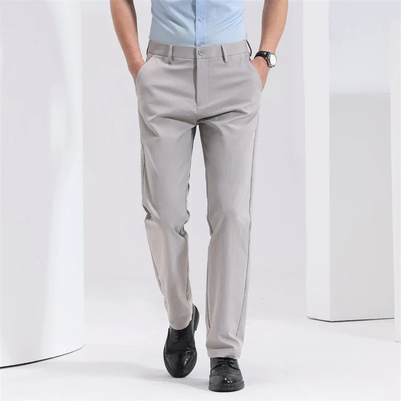 Men's slim-fit flat-front dress pants in khaki