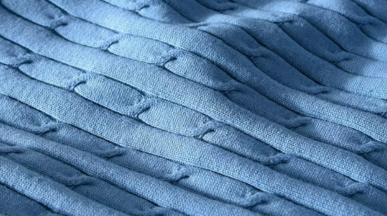Women's Classic Cable Knit Crewneck Sweater with Ribbed Trim in Blue, close-up of the cable knit