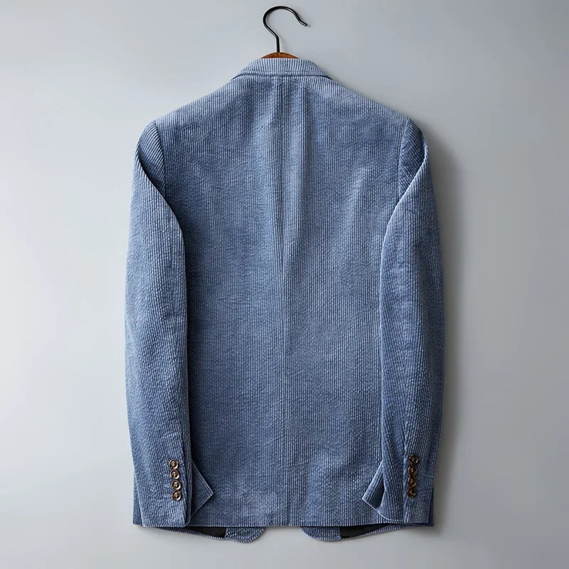 Back view of men's light blue corduroy sport coat with center vent and cuff buttons