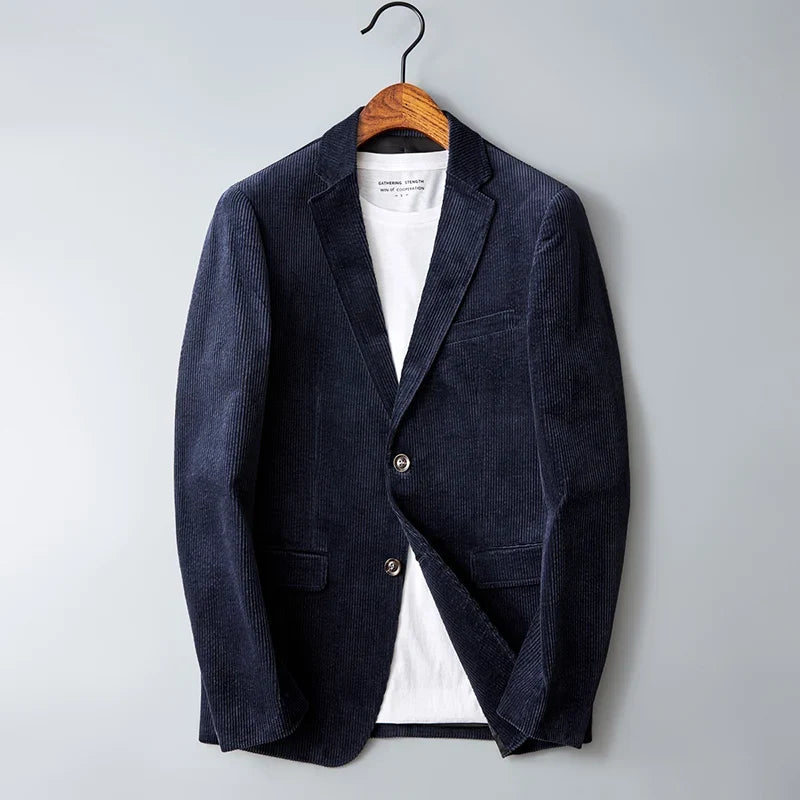 Men's dark blue corduroy sport coat with two-button front over a white t-shirt