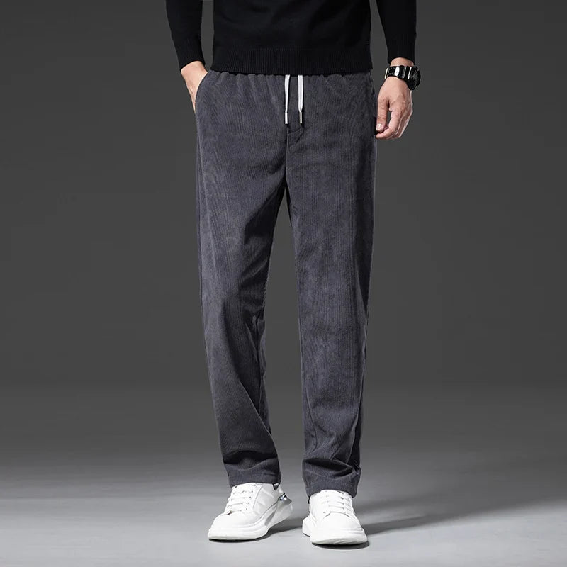 Men's gray corduroy pants with elastic drawstring waist and straight leg