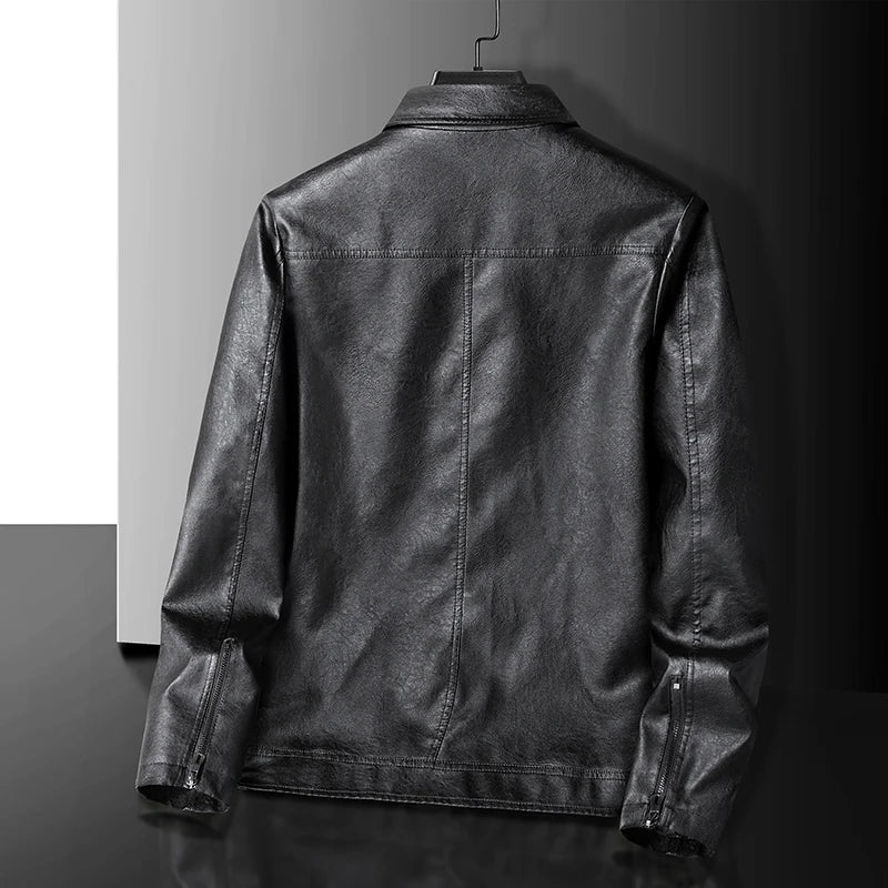 Back view of men's black leather jacket with zip cuffs and clean panel seams