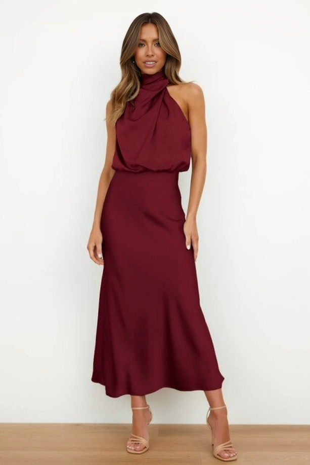 Women's Sleeveless Satin Halter Neck Midi Dress in Burgundy Red, on model