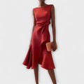 Women's sleeveless red midi dress with twist-front waist and flounced hem