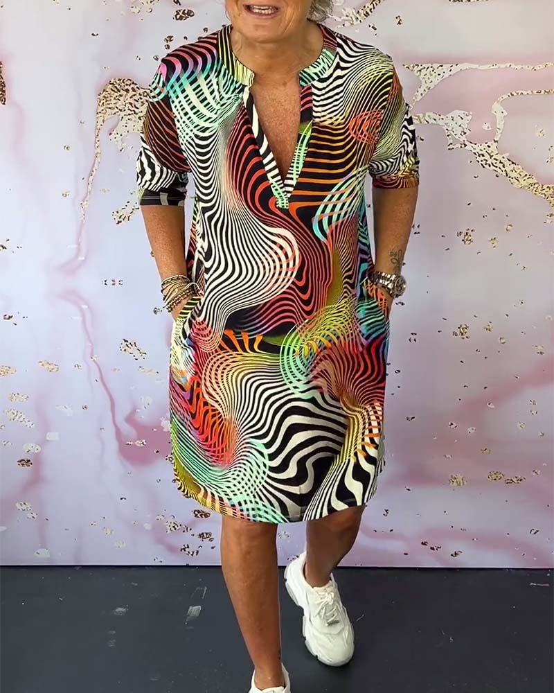 Women's multicolor printed V-neck shift dress with short sleeves and side pockets