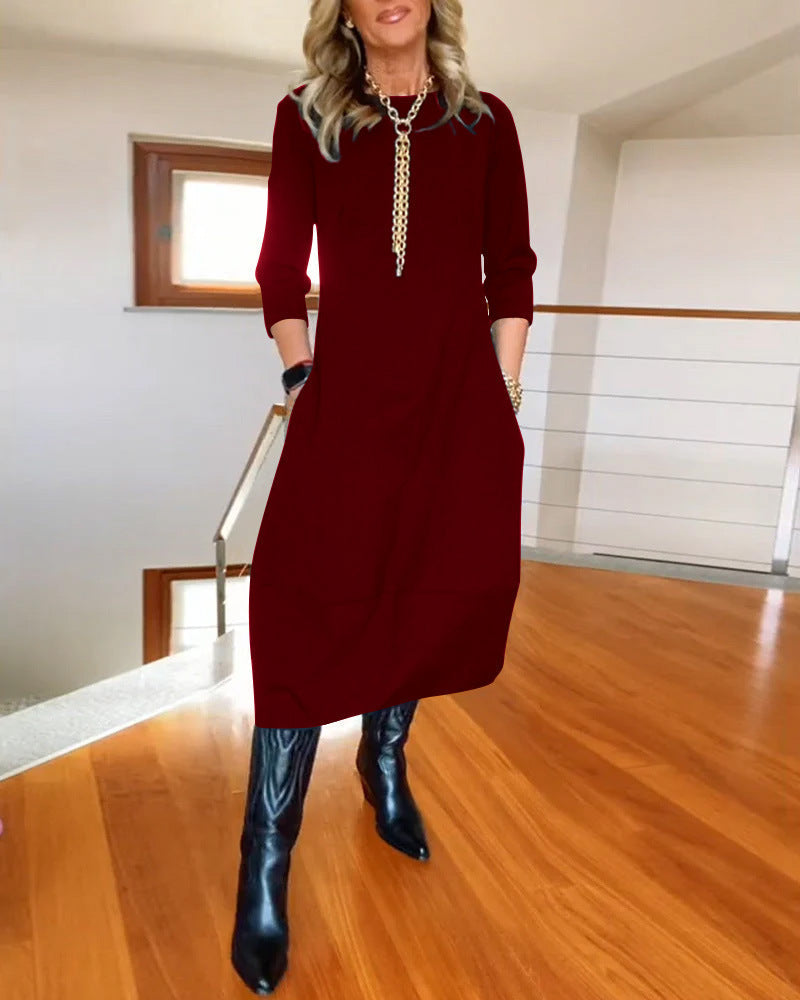 Women's Zip Front 3/4 Sleeve Midi Dress with Pockets in Burgundy, on model