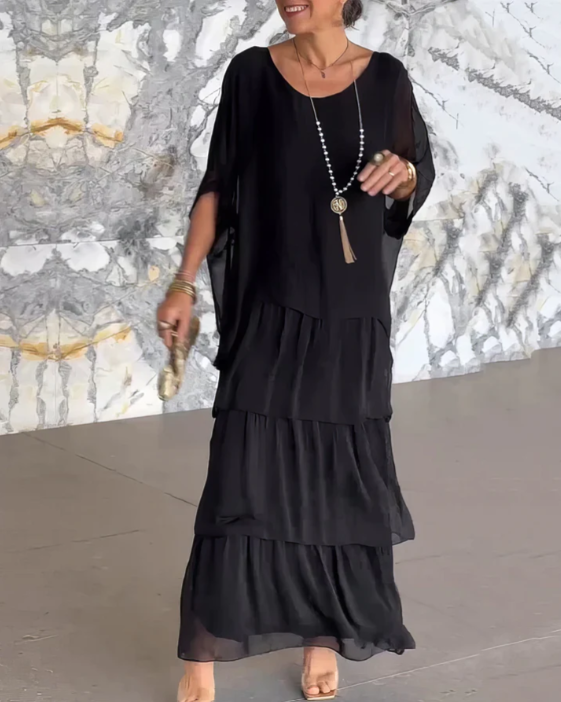 Women's Batwing Sleeve Loose Fit Tiered Maxi Dress in Black, on model