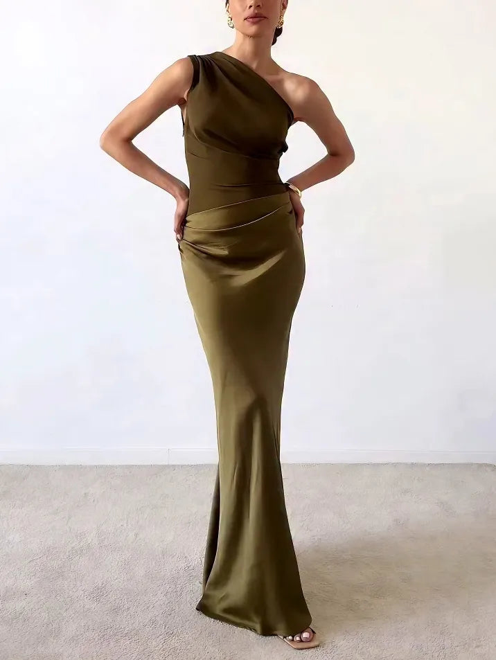 Women's dark green one-shoulder maxi dress with flared floor-length skirt