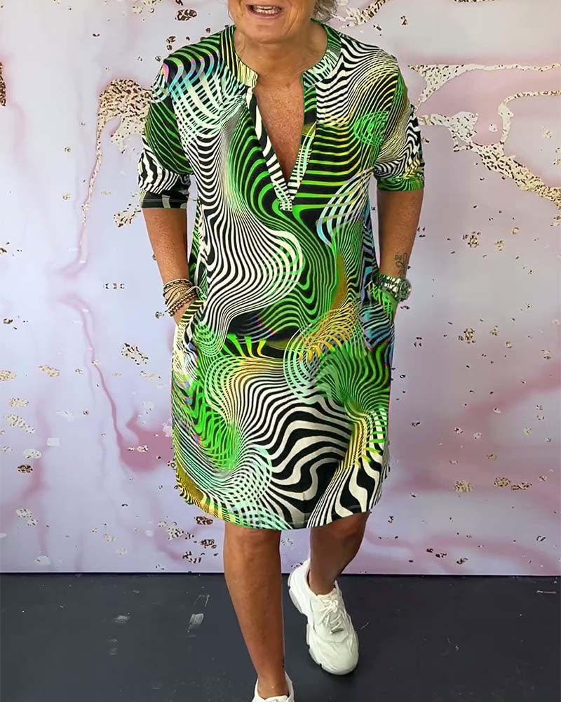 Detail of the wavy op-art print on the multicolor V-neck shift dress