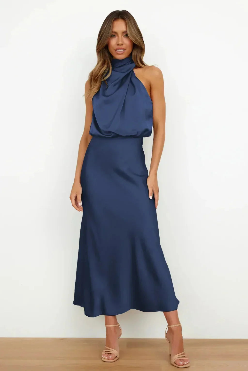 Women's Sleeveless Satin Halter Neck Midi Dress in Marine Blue, on model