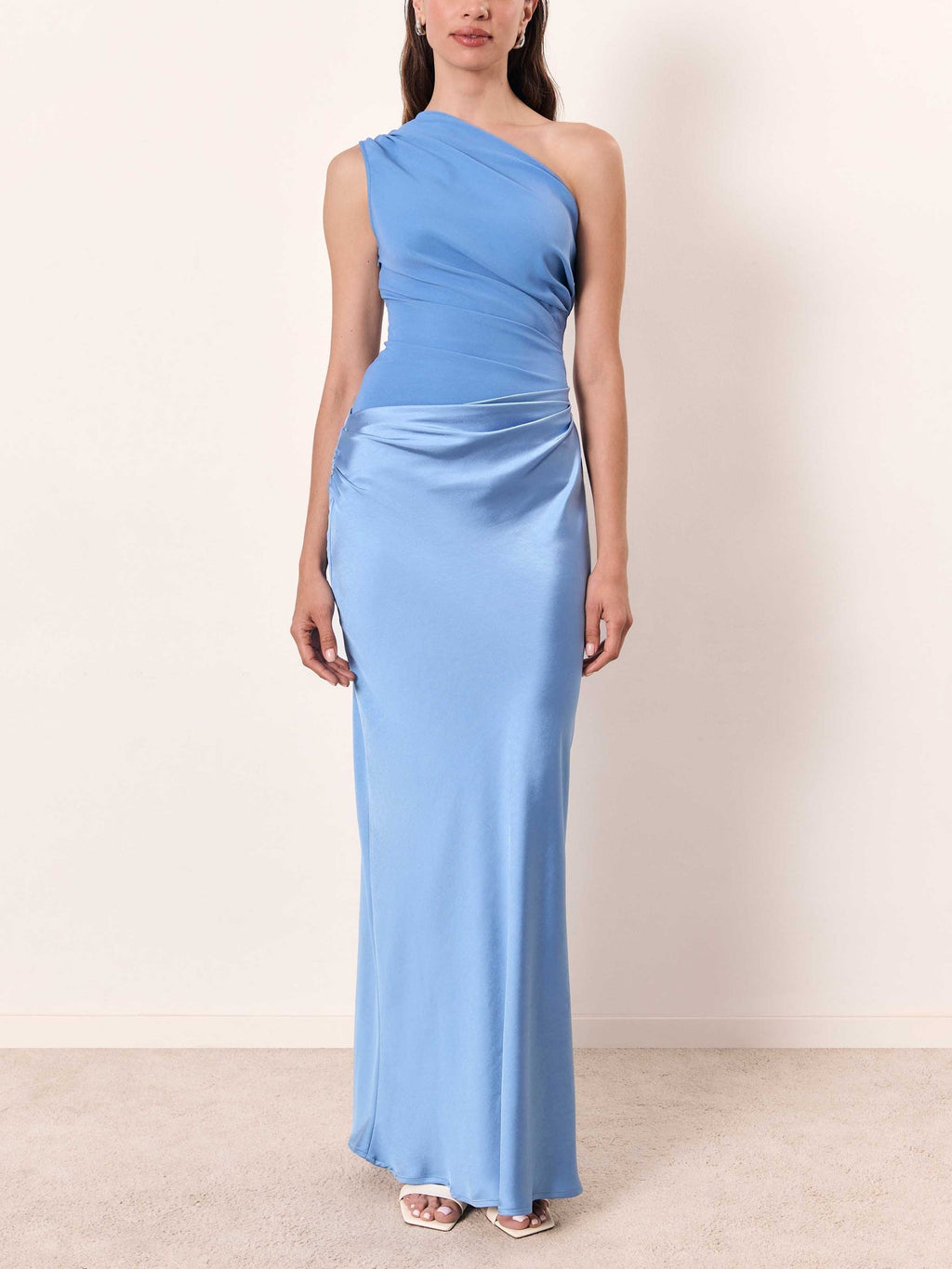 Women's light blue one-shoulder maxi dress with floor-length flared skirt