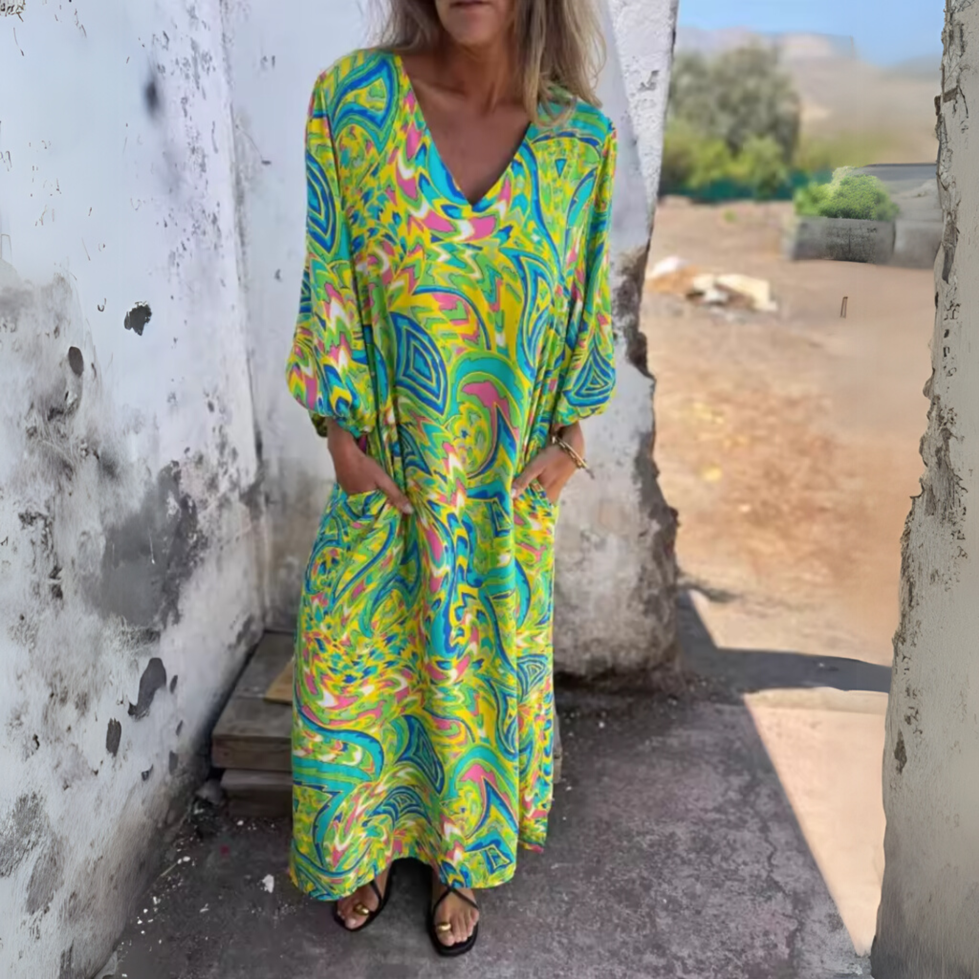 Women's multicolor swirl print maxi dress in green tones with side pockets