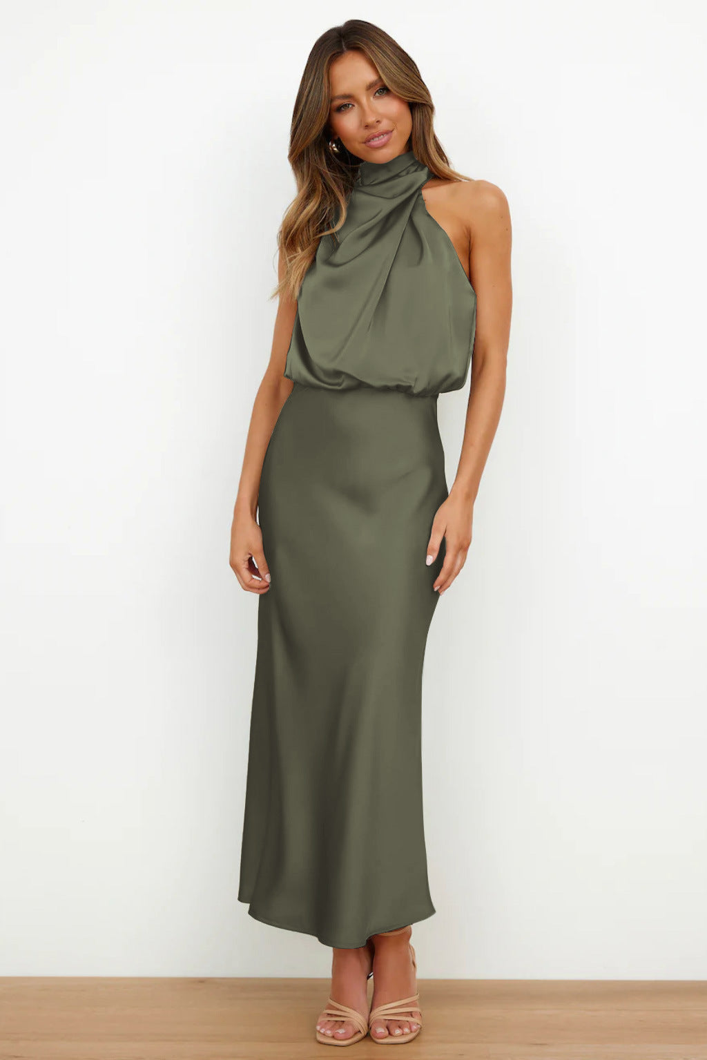 Women's Sleeveless Satin Halter Neck Midi Dress in Olive Green, on model