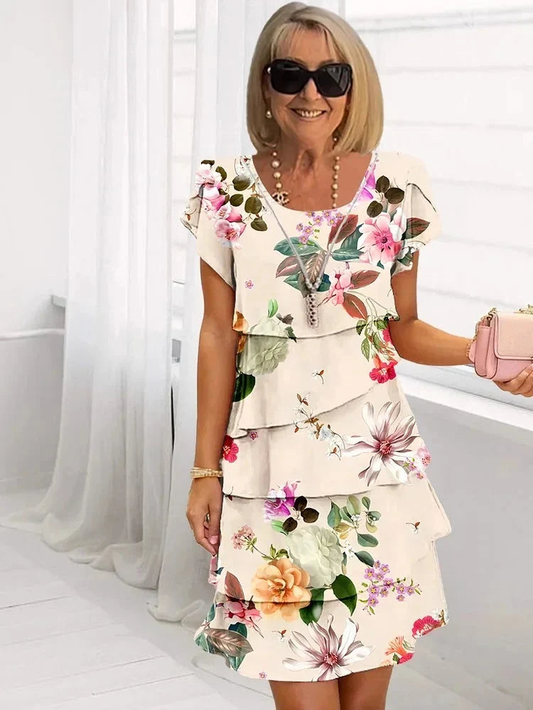 Women's beige floral tiered dress with flutter sleeves