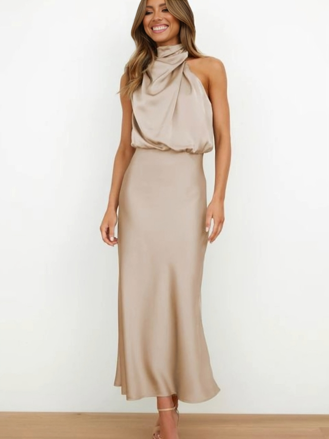 Women's Sleeveless Satin Halter Neck Midi Dress in Beige, on model