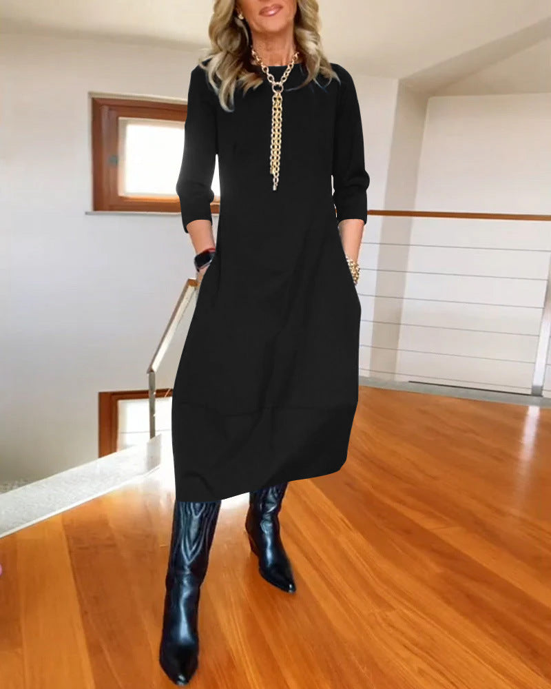 Women's Zip Front 3/4 Sleeve Midi Dress with Pockets in Black, on model