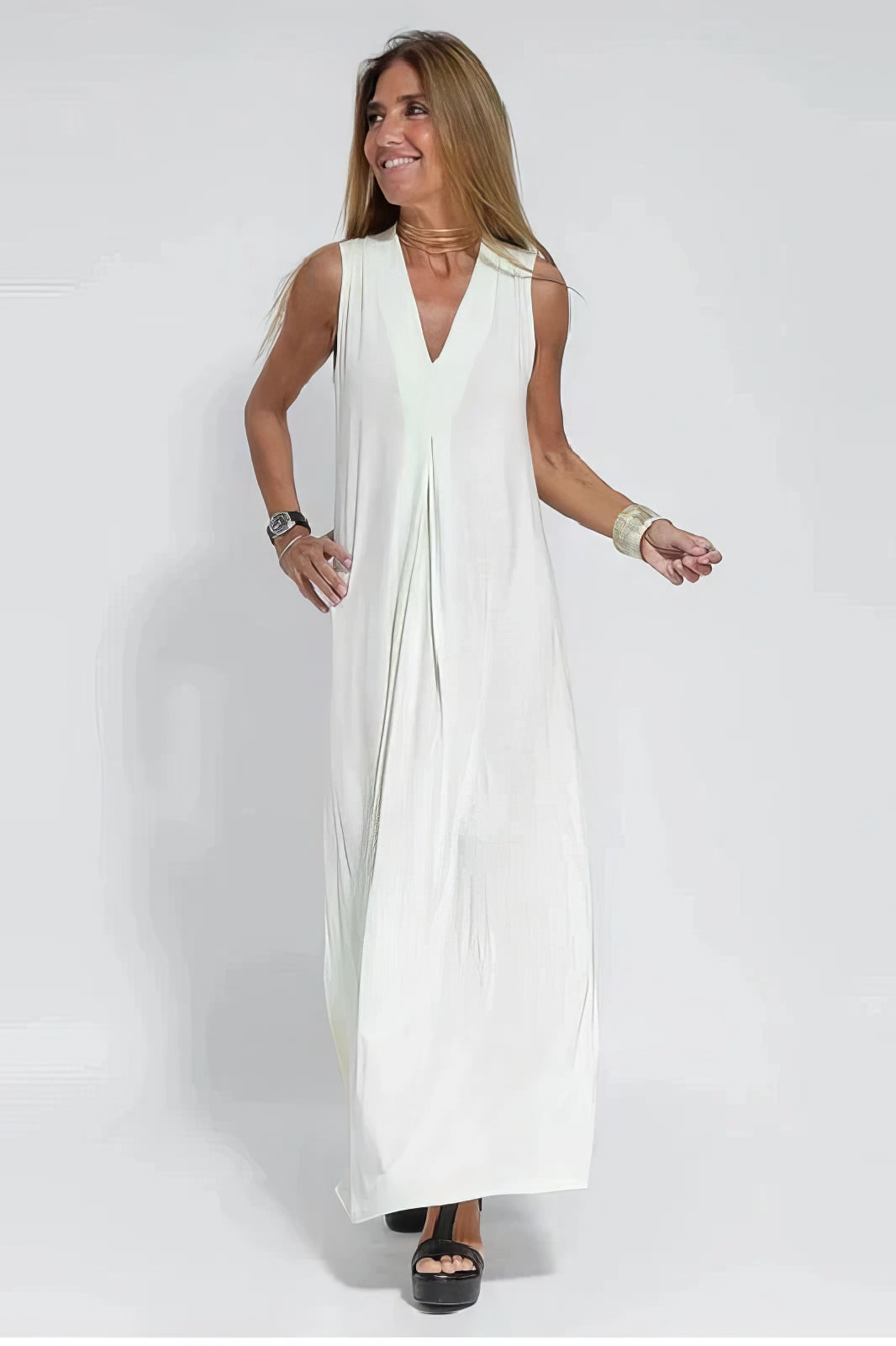 Women's Sleeveless Draped V-Neck Flowy Maxi Dress in White, on model