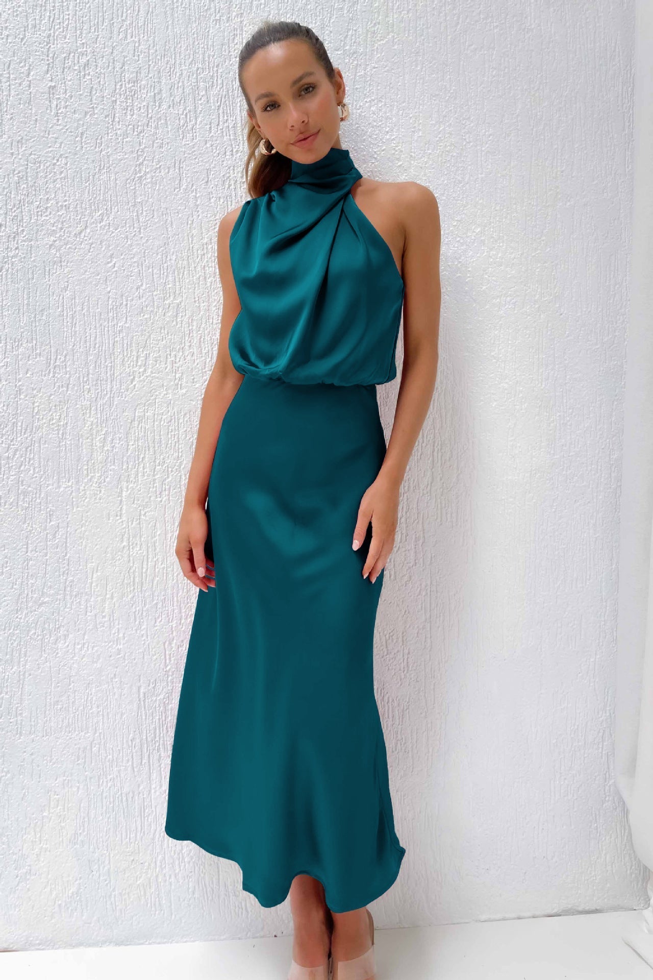 Women's Sleeveless Satin Halter Neck Midi Dress in Turquoise, on model